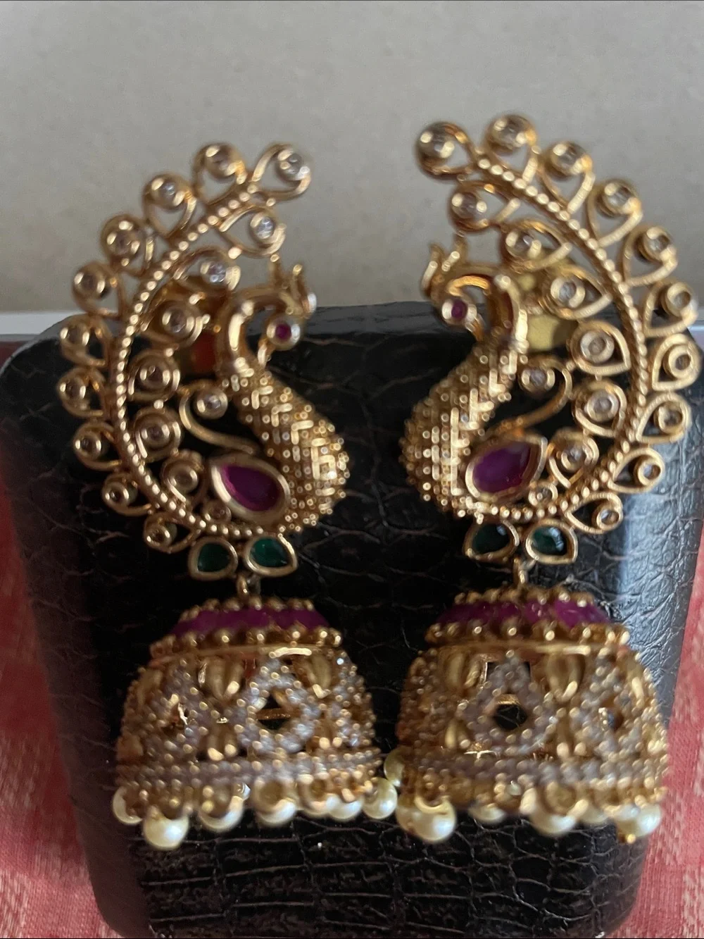 Gold Peacock Jhumka Earrings with Pink and Green Stones